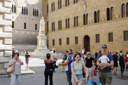 Siena, Tuscany, Italy - September 18, 2019: Piazza Salimbeni. On the square stands a monument to Sallustio Bandini, an economist and politician living at the turn of the 17th and 18th centuries.のeditorial素材