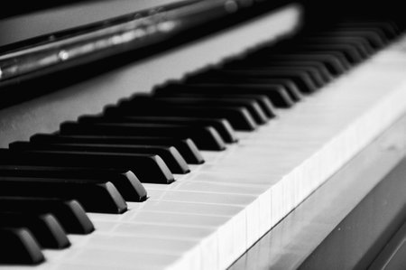 Piano keys of an antique instrumentの写真素材