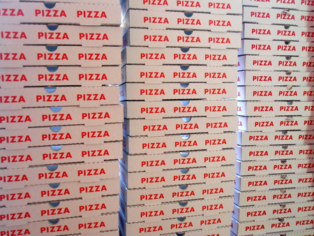 Stack of pizza boxesの写真素材