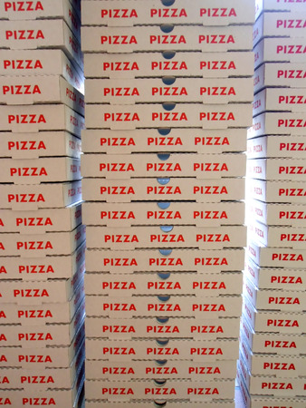 Stack of pizza boxesの写真素材