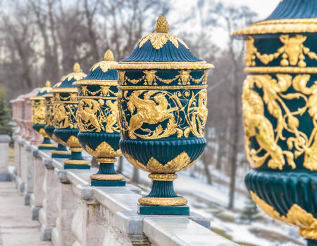 marble vases with gilded bas-relief in the park of Peterhof