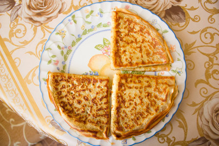 three pancake, folded triangle on the plateの写真素材