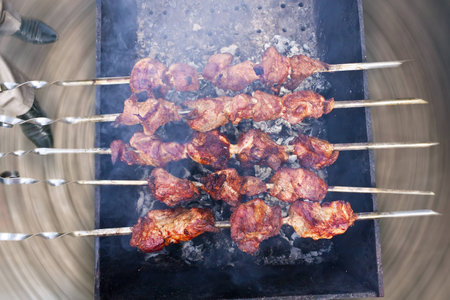 barbeque on the grill, feet in the menの写真素材