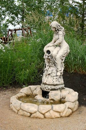 Sculpture girl with a jugの写真素材