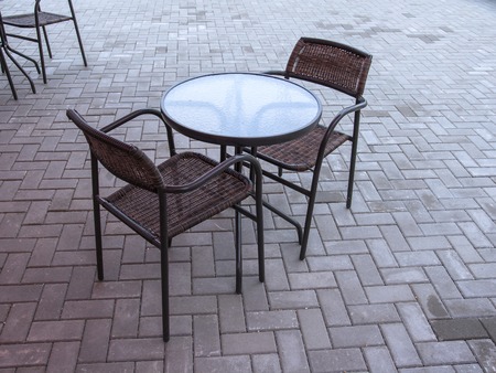 Lonely table and chairs in an empty caf.の写真素材