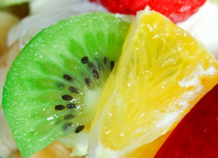 Fruit salad with a strawberries, orange and kiwiの写真素材
