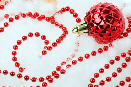 Red beads and the ball for Christmasの写真素材