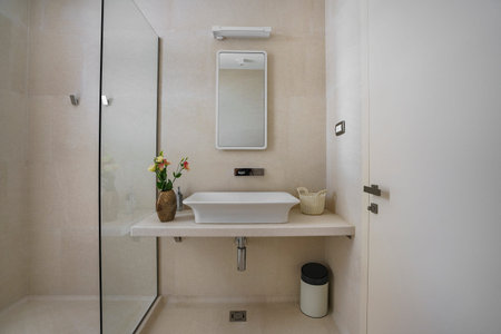 Interior of a bathroom in soft light colours in a luxury villa