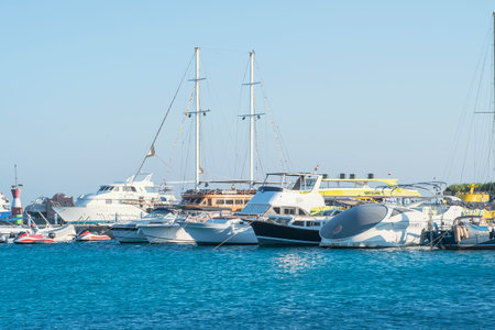 Hurghada, Egypt, November 19, 2021: View of Hurgada marina. Motorboats, ships and yachts moored at...