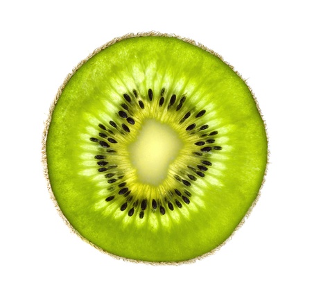 Closeup of kiwi slice isolated on white backgroundの写真素材