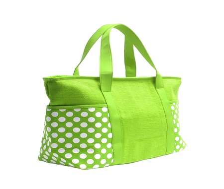 bright striped beach bag isolated on whiteの写真素材