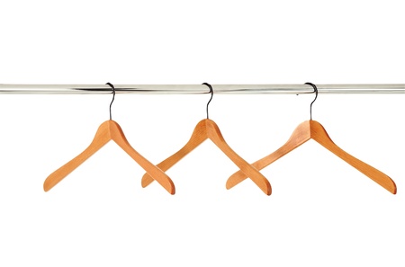 wooden clothes hangers isolated on white backgroundの写真素材