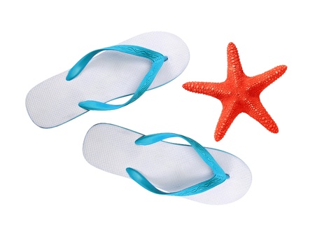 beach shoes and red seastar isolated on whiteの写真素材