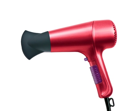 red color hair dryer isolated on white backgroundの写真素材
