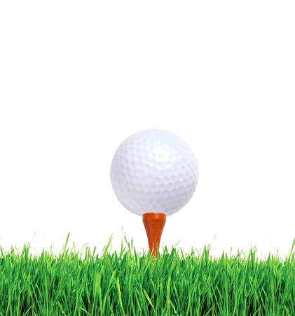 Golf ball on green grass over white backgroundの写真素材