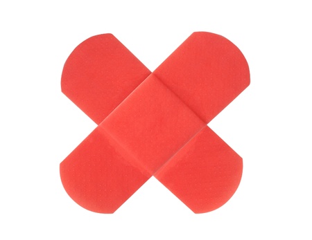 Red medical patch isolated on whiteの写真素材