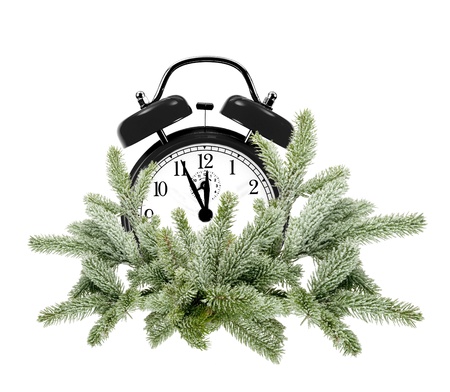 Green Christmas tree and alarm clock isolated on white backgroundの写真素材
