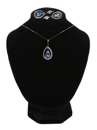 beautiful necklace and earrings on mannequin isolated on white の写真素材