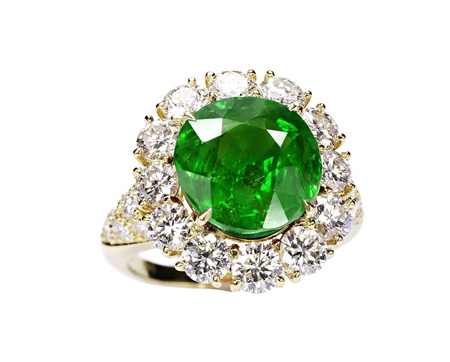 beautiful ring with green gem isolated on whiteの写真素材