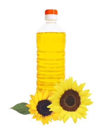 oil in bottle and sunflower isolated on whiteの写真素材