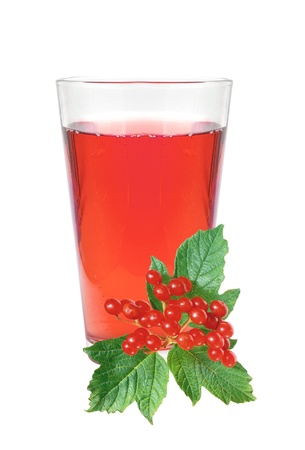 glass of juice and fresh currant berries isolated on whiteの写真素材