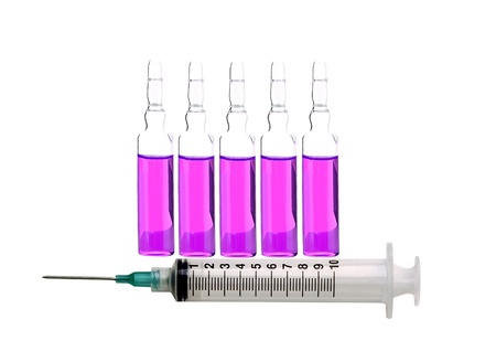 Syringe and medical ampoules isolated on white backgroundの写真素材