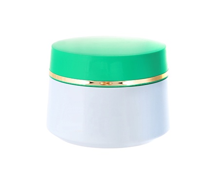 glass jar of face cream isolated on whiteの写真素材