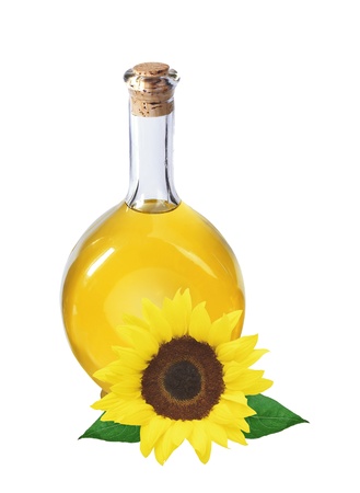 oil in bottle and sunflower isolated on whiteの写真素材