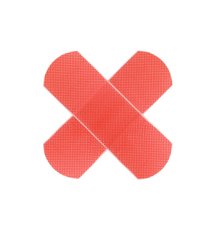 Red medical patch isolated on white backgroundの写真素材