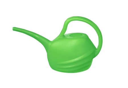 Green plastic water can isolated on whiteの写真素材