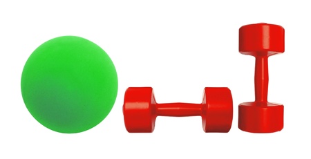 Red dumbbells fitness and green ball isolated on white backgroundの写真素材