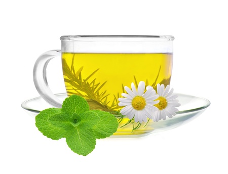 cup of green tea with chamomile flowers and mint isolated on white backgroundの写真素材