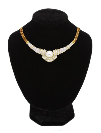 necklace with pearl on black mannequin isolated on whiteの写真素材