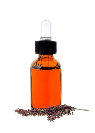 bottle with essence oil isolated on whiteの写真素材