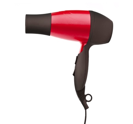 Fashion red hair dryer isolated on whiteの写真素材