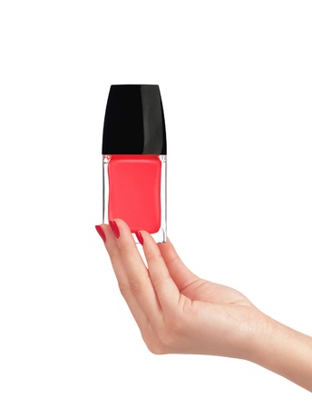 Woman hand with red nail polish isolated on white backgroundの写真素材