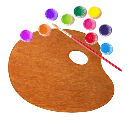 wooden palette with color paints and brush isolated on white backgroundの写真素材