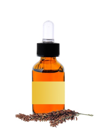 bottle with essence oil isolated on whiteの写真素材