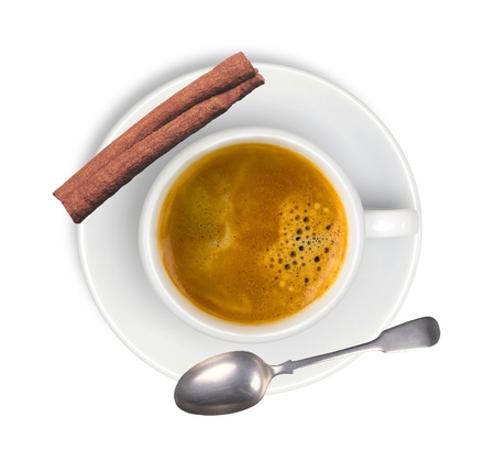 white cup with espresso coffee and cinnamon isolated on whiteの写真素材