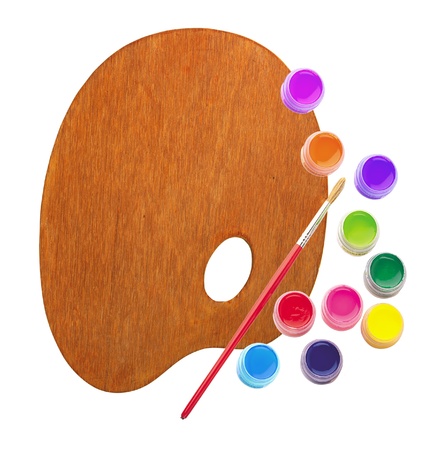 wooden palette with color paints and brush isolated on white backgroundの写真素材