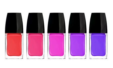 multicolor nail polishes isolated on white backgroundの写真素材