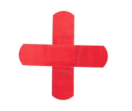 Red medical patch isolated on whiteの写真素材