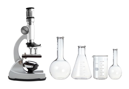 Laboratory metal microscope and empty test tubes isolated on whiteの写真素材