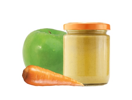 Jar with fruit and vegetables baby food isolated on whiteの写真素材