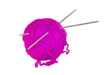 Pink knittings yarn isolated on whiteの写真素材
