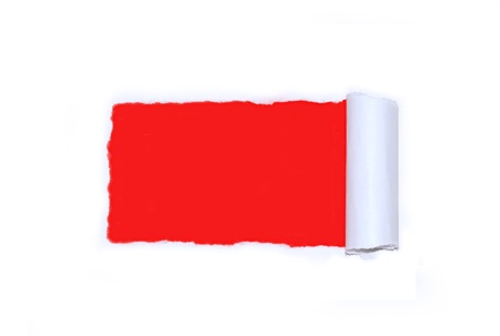 Ripped white paper over redの写真素材