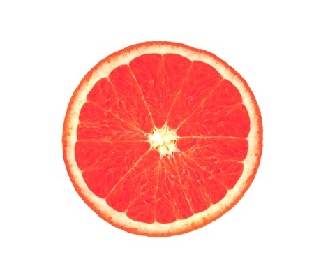 Slice of ripe grapefruit isolated on whiteの写真素材