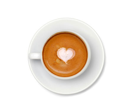 Latte coffee with heart symbol isolated on white backgroundの写真素材