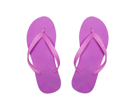 pink beach shoes isolated on white backgroundの写真素材