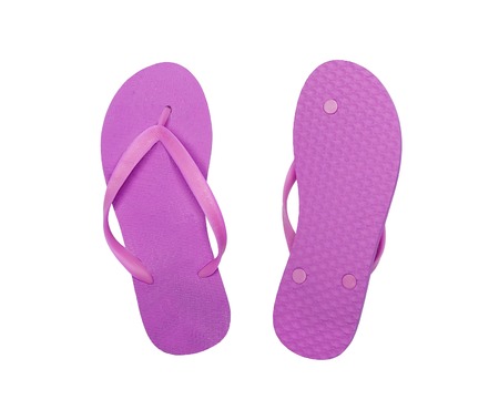 pink beach shoes isolated on white backgroundの写真素材